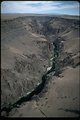 An aerial view of the Owyhee River running through the Owyhee Canyon.  OR 3-195