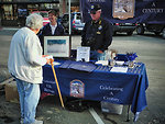 Centennial Booth at the Farmer's Market