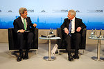 Secretaries Kerry, Hagel Share a Laugh Before a Joint Panel Discussion at Munich Security Conference