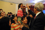 Secretary Kerry Greets a Family Member of Embassy Manila Staff