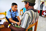 Dr. Hendra Samanta Examines a Local Indonesian Man