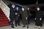 Secretary Kerry Is Greeted By Ambassador Mull and His Wife Upon Arriving in Warsaw, Poland