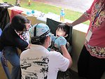 A Pacific Partnership 2010 Dentist Treats Cambodian Child