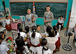 U.S., Philippine servicembers visit school children