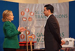 Secretary Clinton With a Member of Secure Transactions