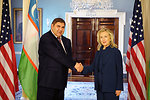Secretary Clinton Shakes Hands With Uzbek Foreign Minister GanievSecretary Clinton Shakes Hands With