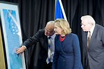 Secretary Clinton, Rob Fenwick, and Art Brown View the Waystation Chart