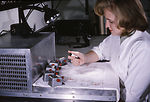 A CDC laboratorian is shown here working with mosq