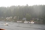  A rainy day at Gig Harbor.  Sport fishing boats are undeterred by the rain. 