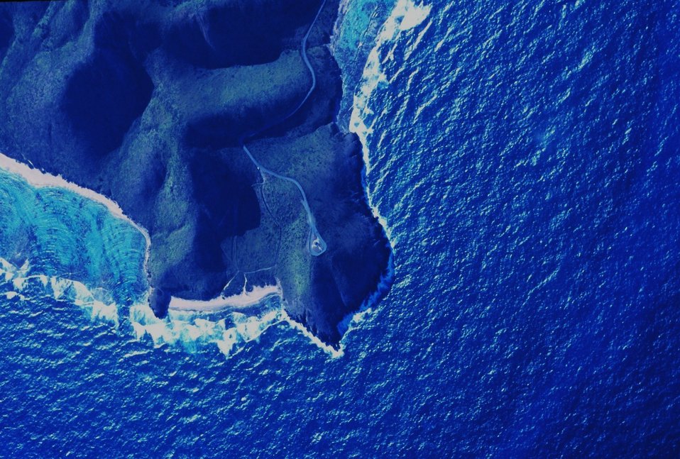  Point Udall, the easternmost point of U. S. territory in the Western Hemisphere.  Note wave refraction patterns in the shallow water to the left of the point. 