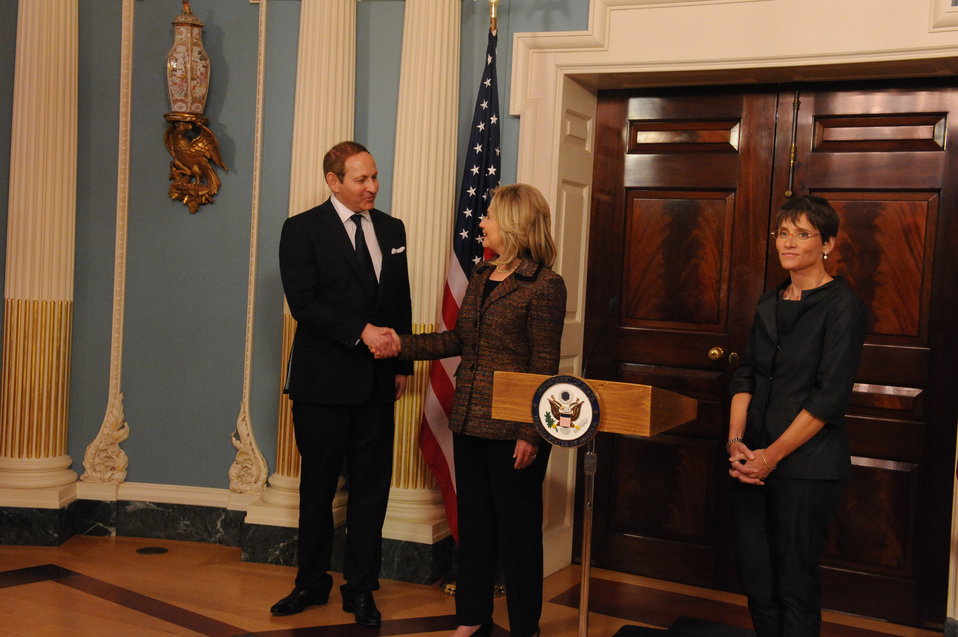 Secretary Clinton Shakes Hands With Partners of the M∙A∙C AIDS Fund