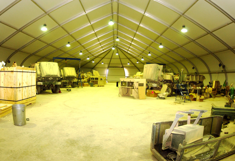 Airmen add armor to convoy vehicles