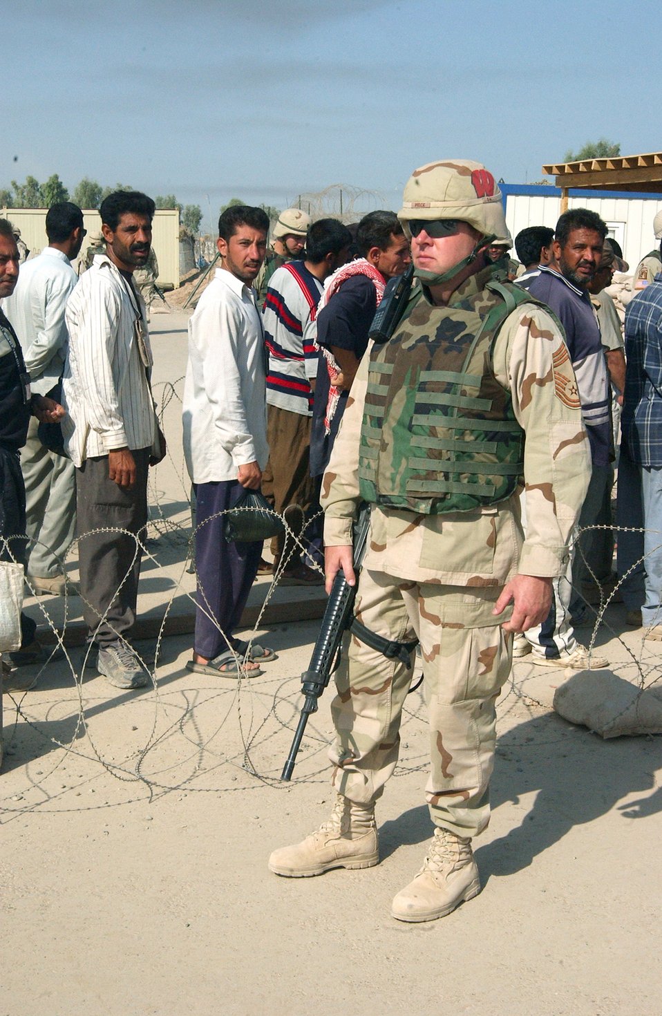 Escorts keep watch over foreign workers