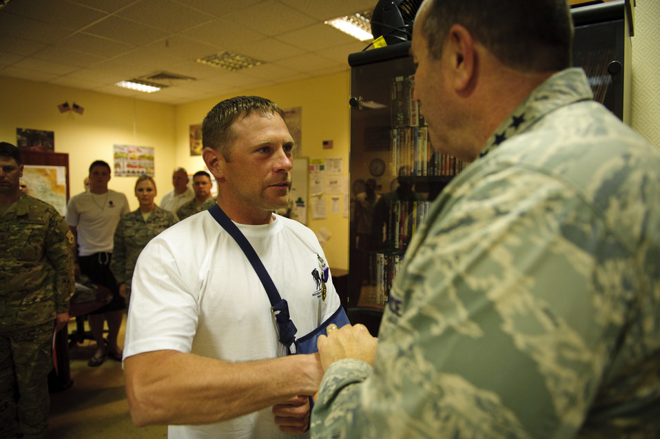 Breedlove presents Purple Heart to wounded Airman