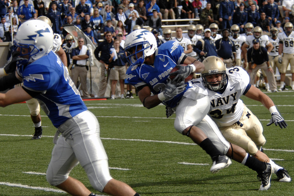 Football: Navy holds off Falcons