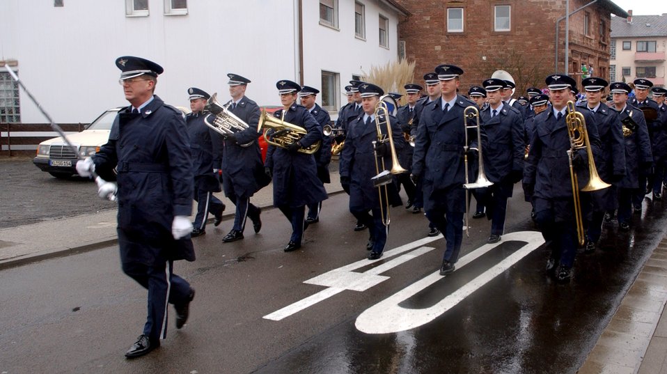 U.S. Air Forces in Europe Band members participate in the local Fasching Parade in Ramstein Village, Germany, on Tuesday, Feb. 28, 2006. The