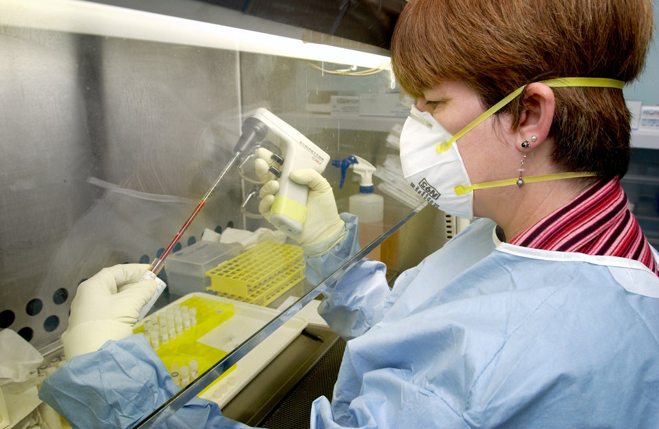 This is Deborah Cannon of the Special Pathogens Branch as she processes SARS specimens.