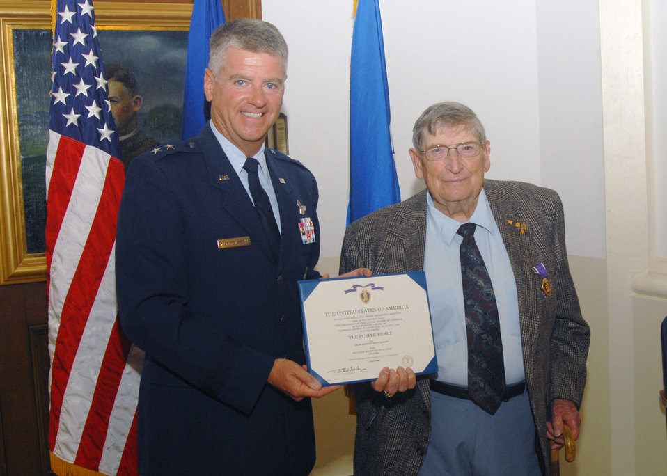 B-24 gunner receives Purple Heart for heroism in WW II