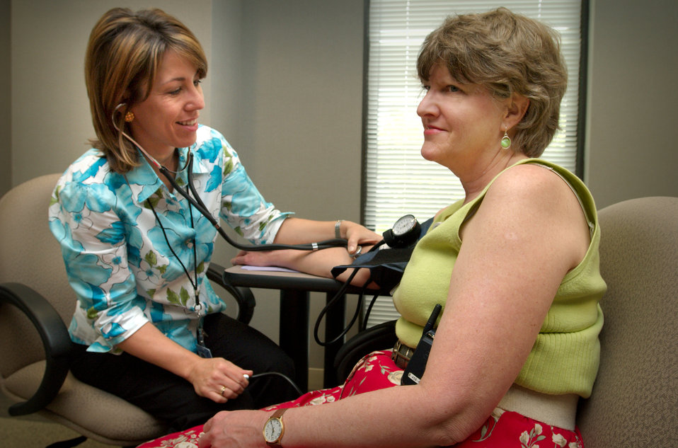 Here, CDC employee, Robyn Morgan (left), was shown having her blood pressure read by Robyn Morgan, of the National Center for Chronic Diseas