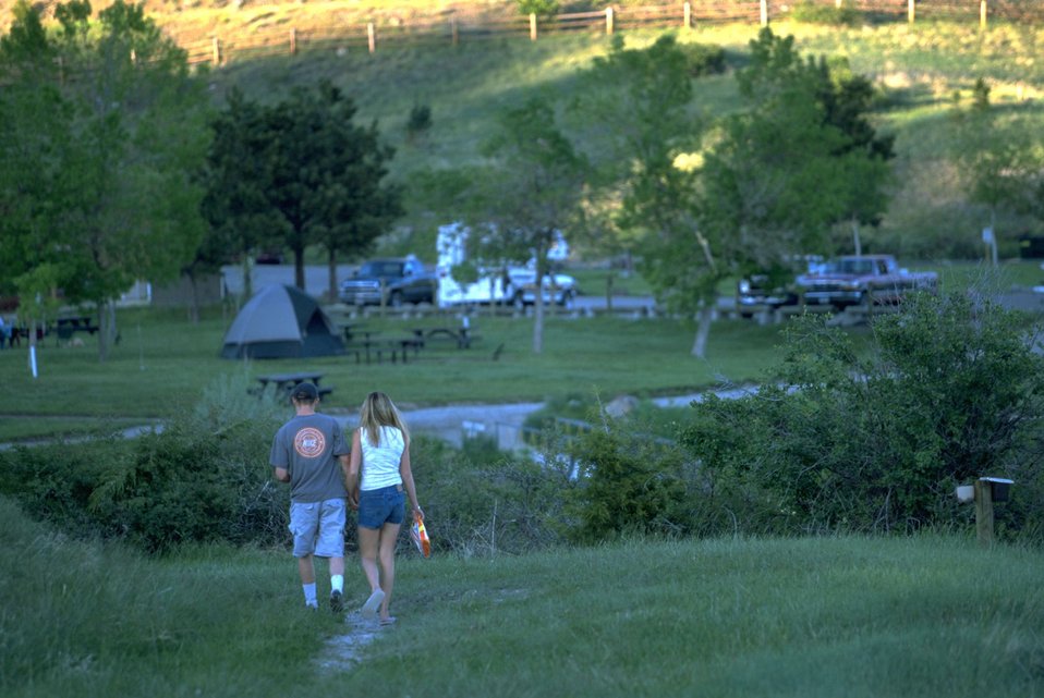 Couple walking in Holter Lake Campground