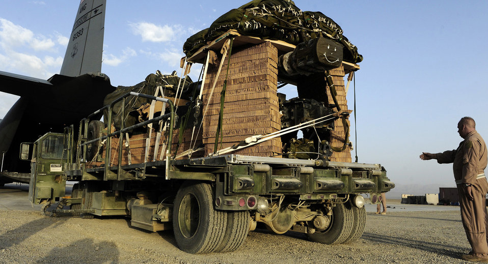 Total-force team airdrops 10-ton artillery load