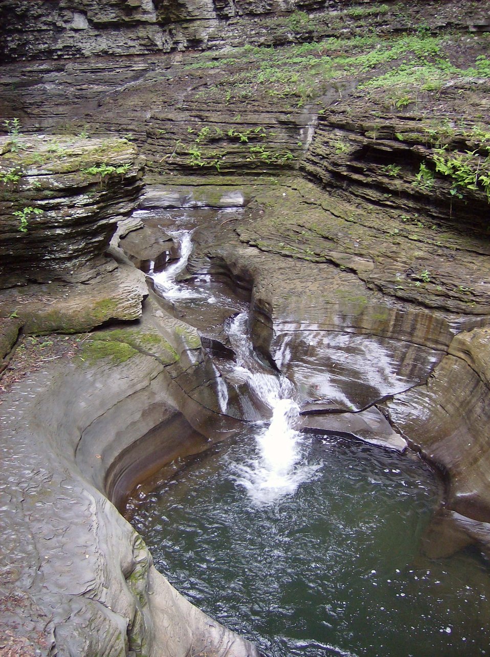  Babbling stream flowing into a bowl-like pool at Watkins Glen State Park. 